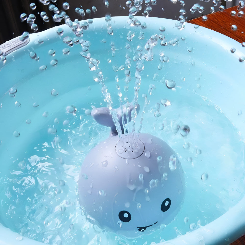Bade-Spielzeug Automatischer Wassersprüher Wal Licht-Dreher